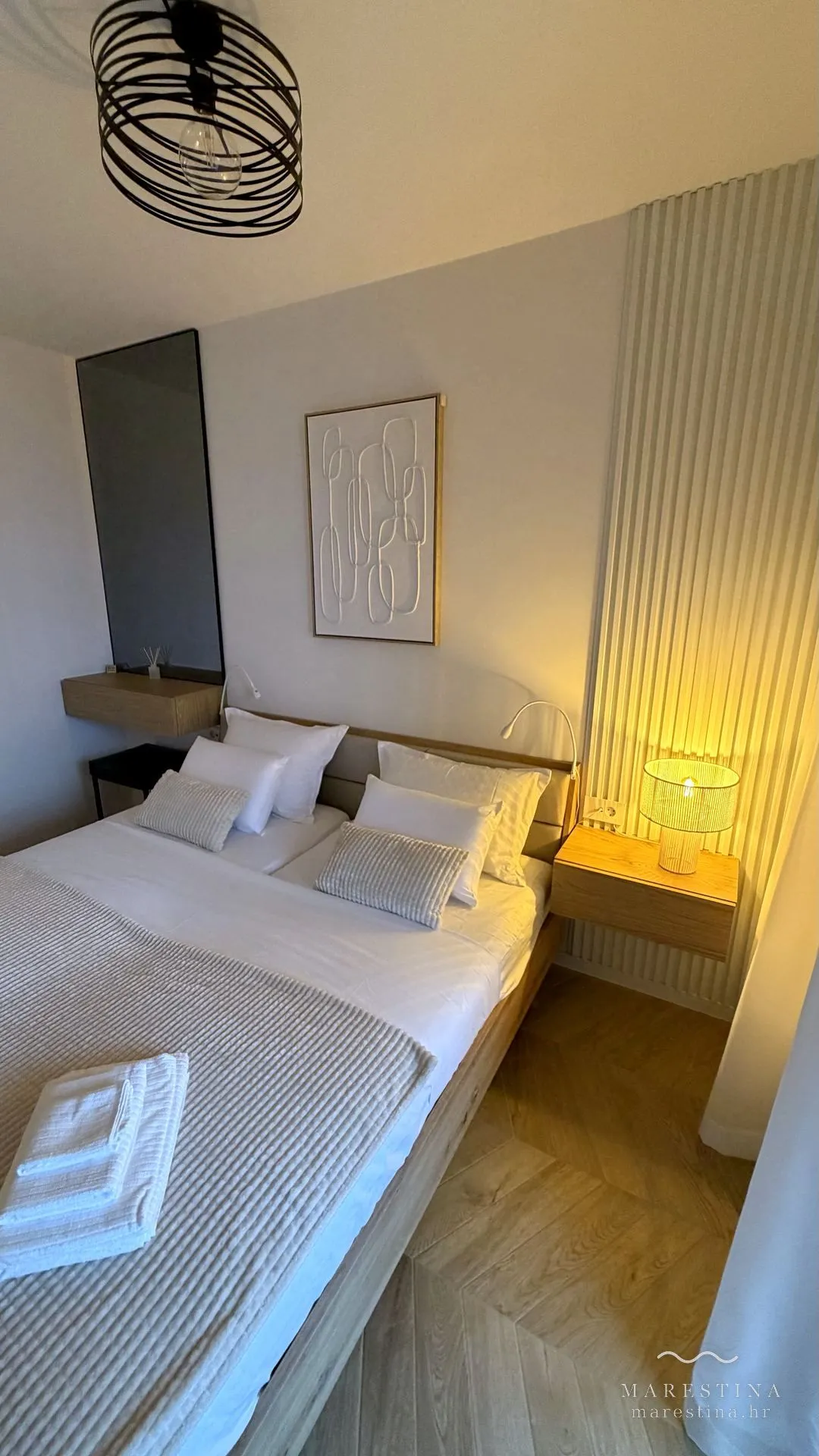 Main bedroom with double bed and balcony access